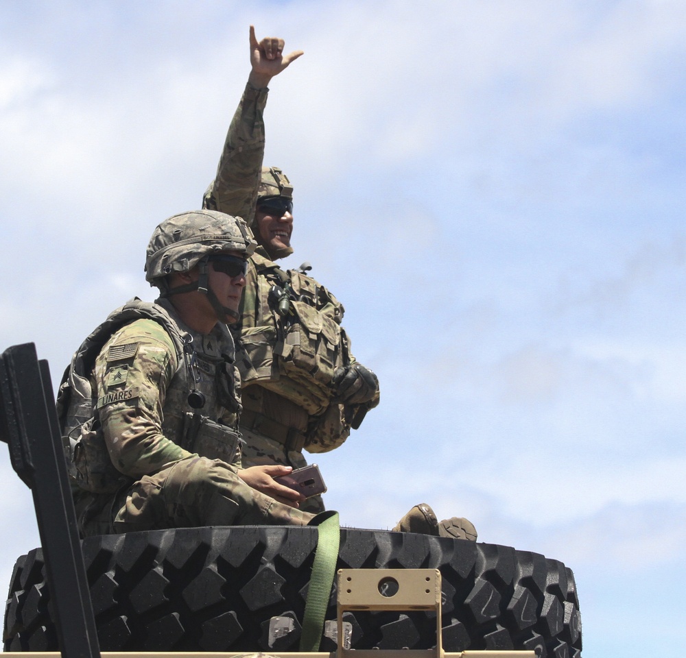 U.S. Army Soldiers cheer for the RIMPAC 2018 live fire exercise