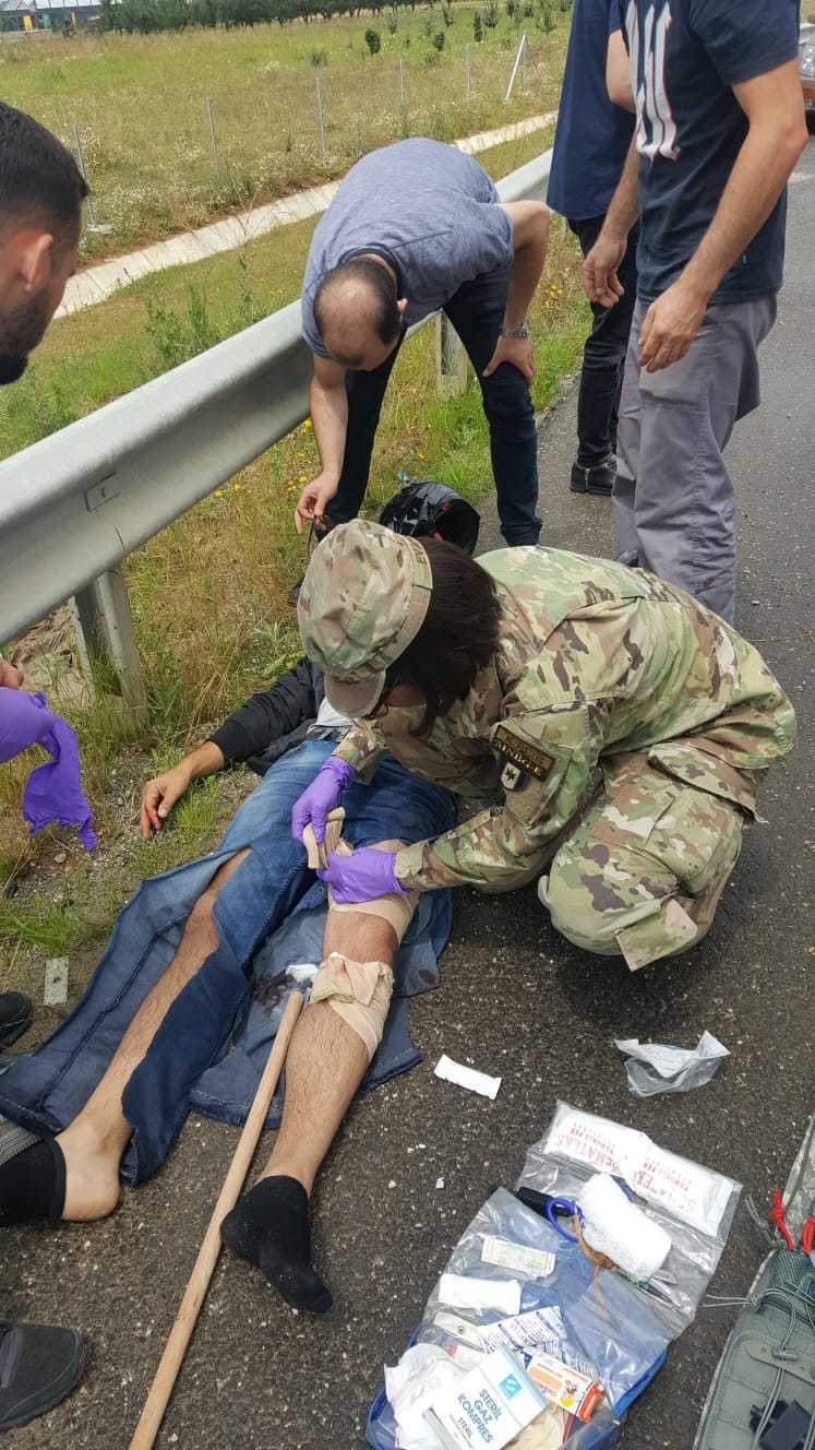 KFOR Soldiers render aid to motorcycle accident victim