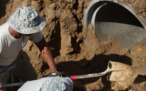 166th Civil Engineer Squadron install concrete storm water pipes for Camp Kamassa.
