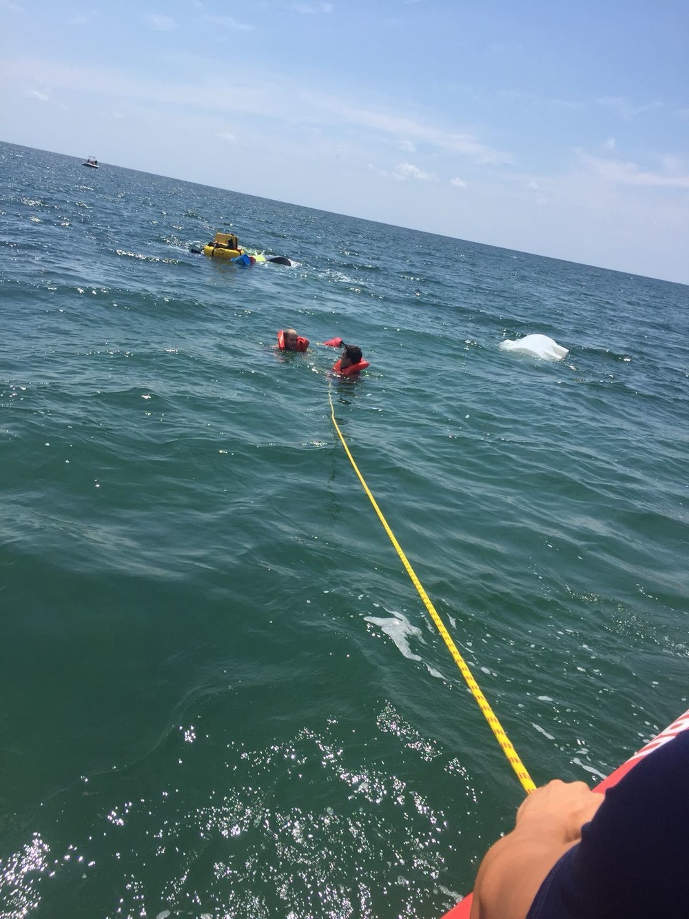 Coast Guard, good Samaritan rescue 2 from capsized vessel near Islamorada