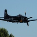 Skyraider makes a pass for a delighted audience