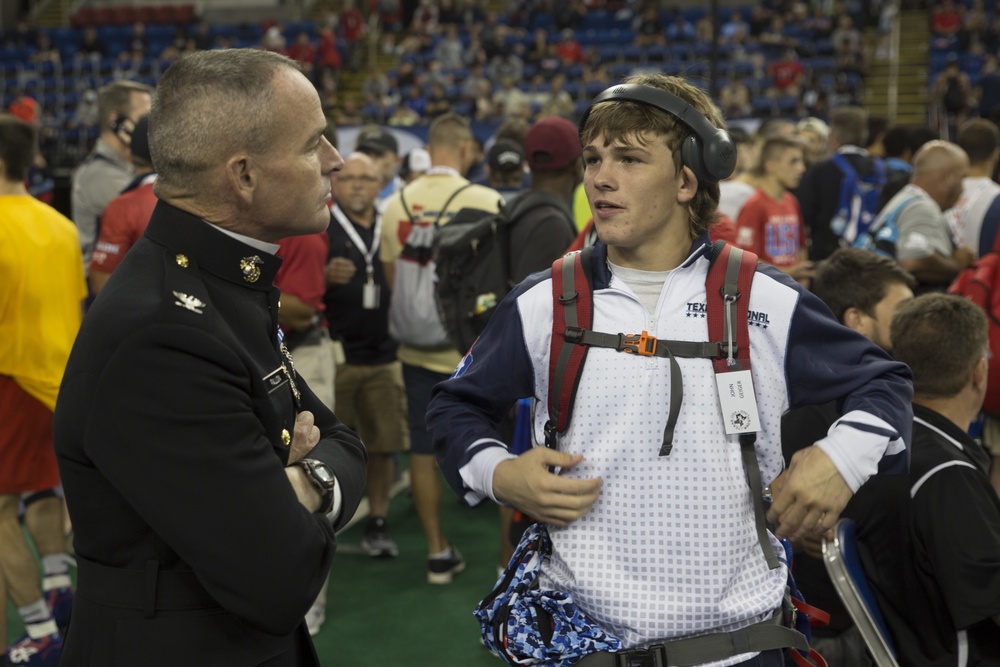 Marine colonel speaks with wrestling competitors