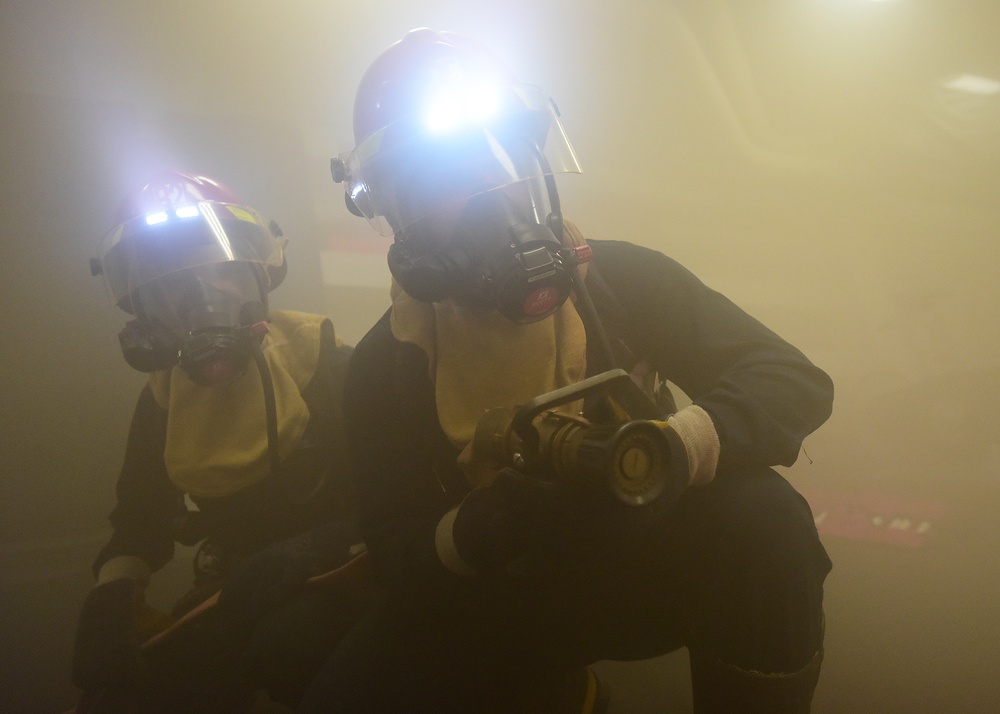 BLR Sailors train during a Flying Squad fire drill.