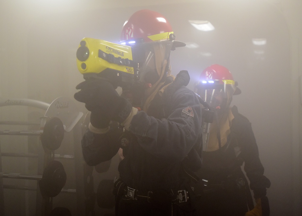 BLR Sailors train during a Flying Squad fire drill.