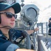 USS Antietam (CG 54) Sailor stands watch during a replenishment at sea with USNS Walter S. Diehl (T-AO-193)