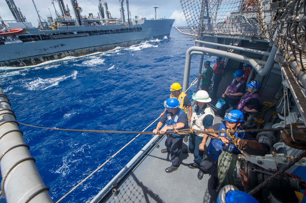 Sailors assigned to USS Antietam (CG 54) prepare to receive fuel from USNS Walter S. Diehl (T-AO-193)