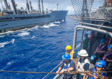 Sailors assigned to USS Antietam (CG 54) prepare to receive fuel from USNS Walter S. Diehl (T-AO-193)