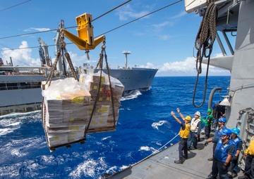 USS Antietam (CG 54) Sailors prepare to receive supplies during a replenishment at sea with USNS Walter S. Diehl (T-AO-193)