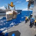 USS Antietam (CG 54) Sailors prepare to receive supplies during a replenishment at sea with USNS Walter S. Diehl (T-AO-193)