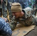 Sri Lankan and U.S. Marine arm wrestle during RIMPAC