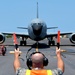 507th Aircraft Maintenance Squadron marshals a 97th Air Mobility Wing KC-135 for RIMPAC 2018