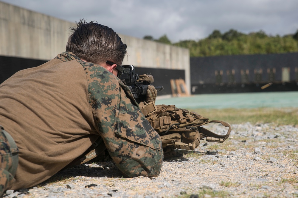 Force reconnaissance Marines conduct pistol and rifle qualification