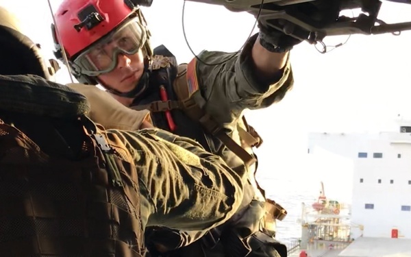 Island Knights of Helicopter Sea Combat Squadron (HSC) 25 evacuate a mariner in distress