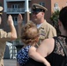 Family members watch with pride during re-enlistment aboard the USS Wisconsin