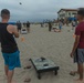 Marines and Sailors compete in CG’s Cup Cornhole Tournament