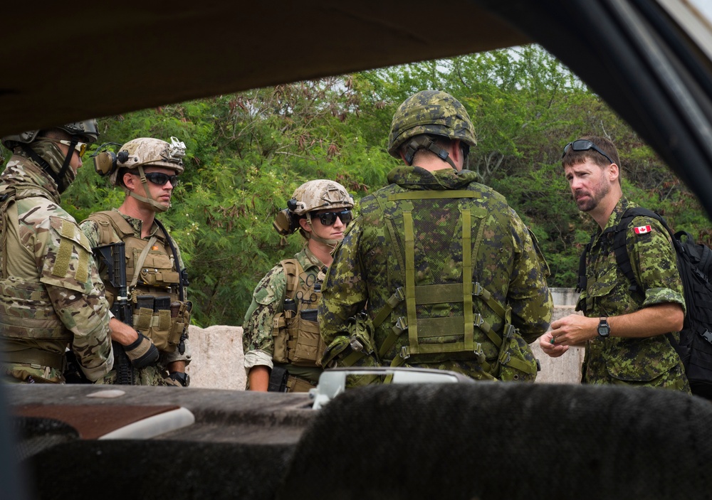 Multinational EOD Teams Work Together On IED Removal