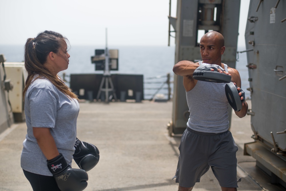 Sparring for exercise on USS Jason Dunham (DDG 109)