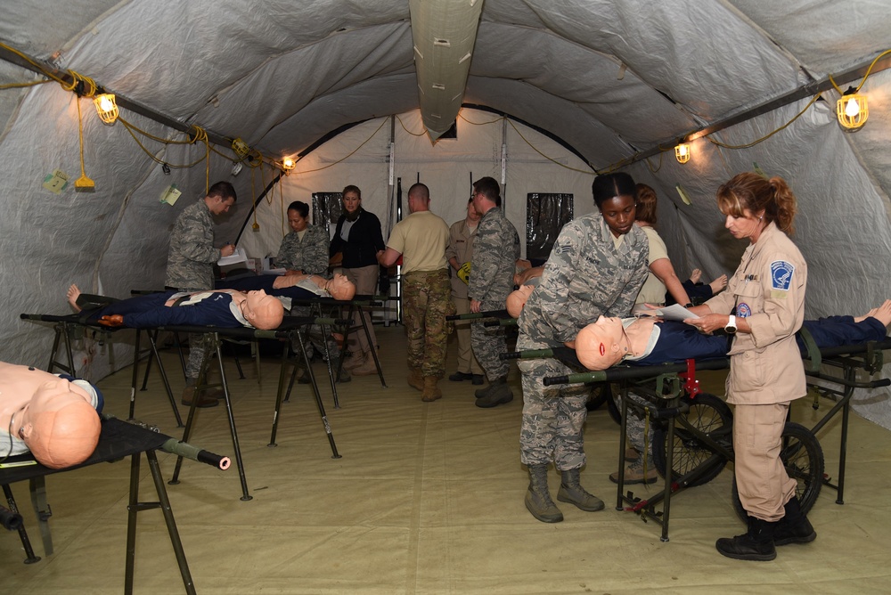 Airmen treat patients with Disaster Medical Assistance Team