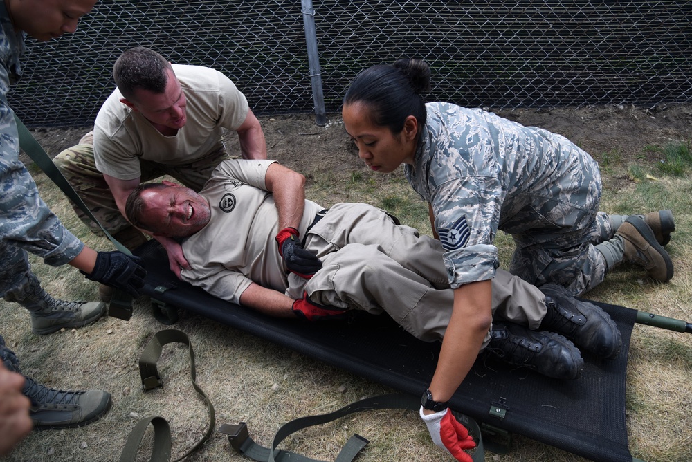 Airmen treat patients with Disaster Medical Assistance Team