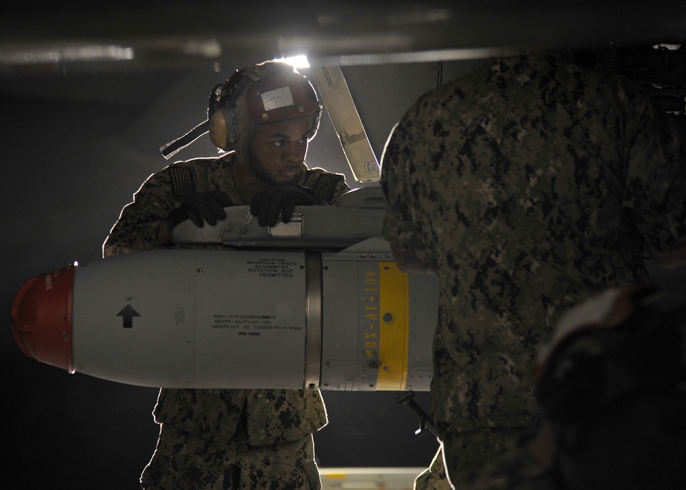 Patrol squadron Sailors upload Maverick missiles during RIMPAC 2018