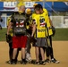 Service members compete in Firecracker Softball Tournament