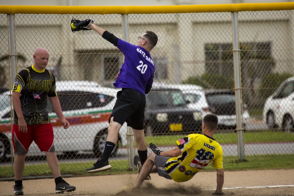 Service members compete in Firecracker Softball Tournament