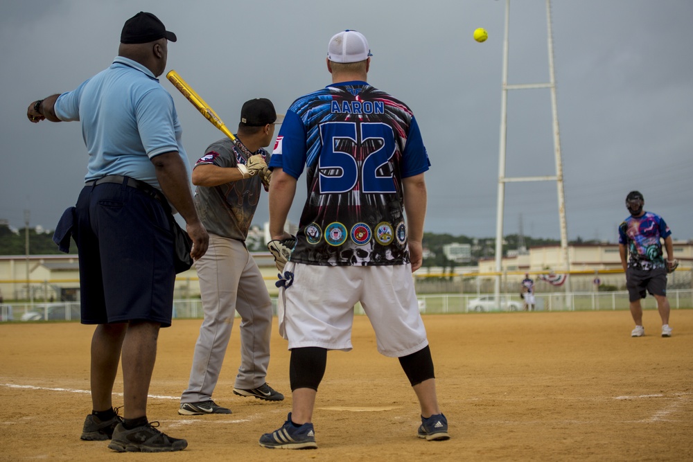 Service members compete in Firecracker Softball Tournament