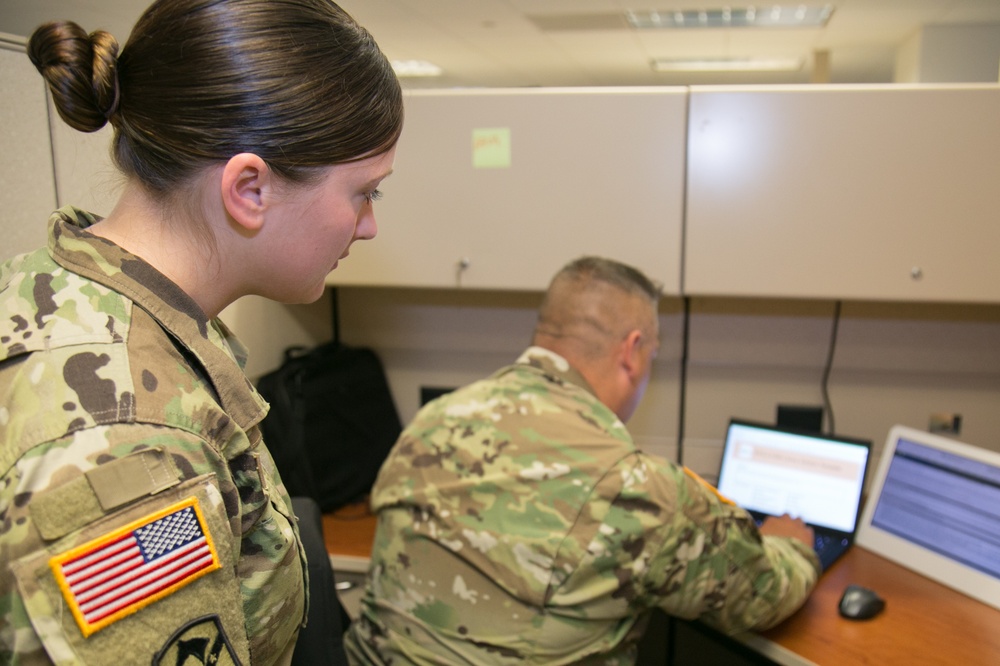 ARNG Soldiers work on IPPS-A CRM database