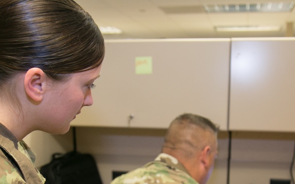ARNG Soldiers work on IPPS-A CRM database