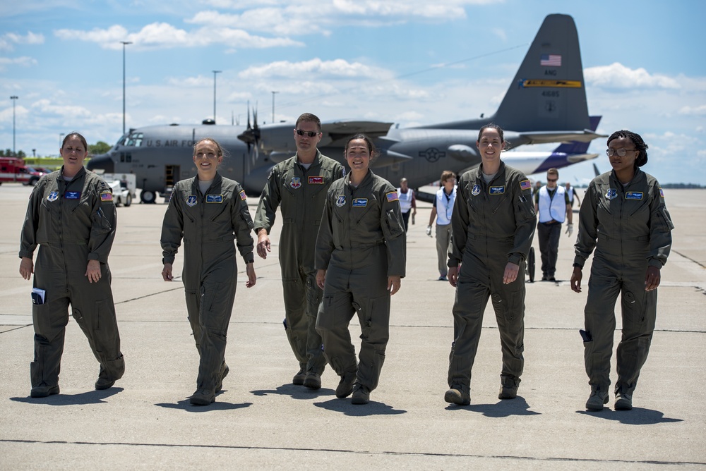 Air National Guard aeromedical flight crew walk off the flightline