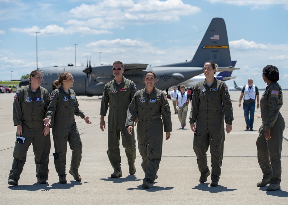 flight crew walk away from a C-130 Hercules