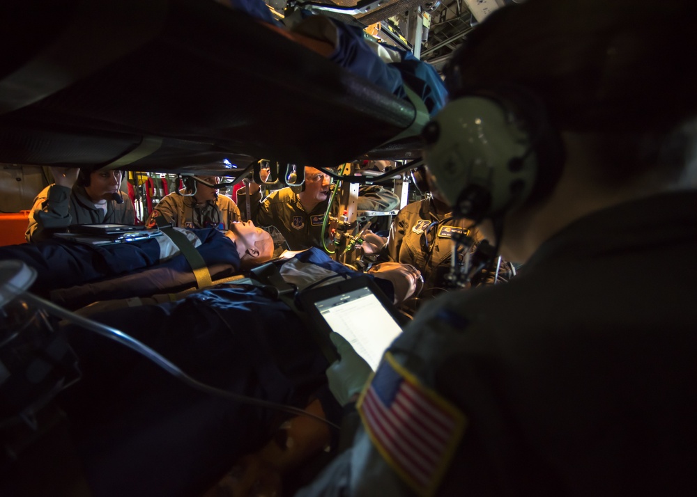 flight medics provide care on a C-130 Hercules