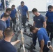 Peruvian sailors from BAP Ferré practice damage control with US Coastguardsmen on board USCGC Bertholf during RIMPAC 2018