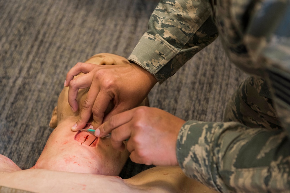 Medical personnel learn Tactical Combat Casualty Care