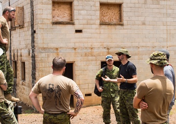 Canadian clearance divers participate in a simulated IED scenario during RIMPAC 2018