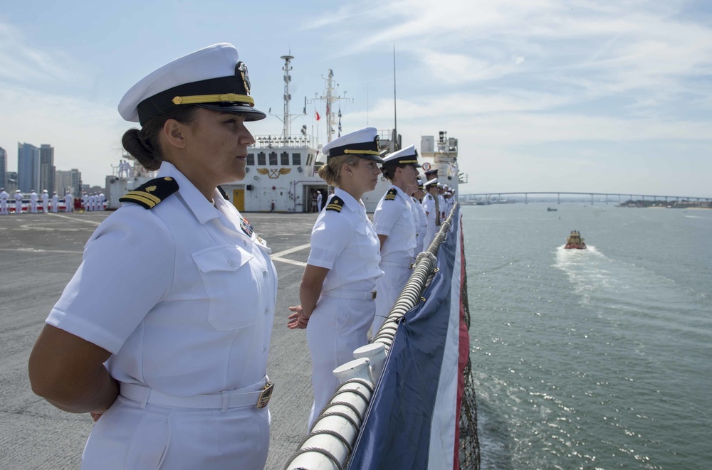 USNS Mercy Sailors man the rails as the ship returns to homeport after completion of Pacific Partnership 2018, participation in RIMPAC 2018