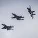 Super Hornets Fly in Formation near Vinson