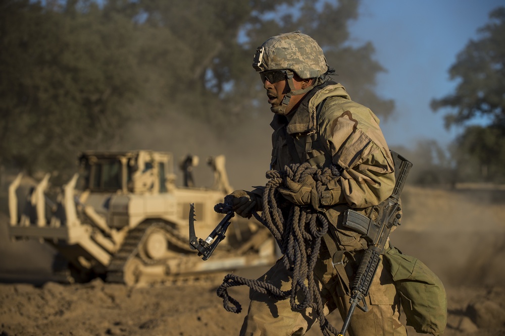 Combat engineers breach through enemy territory to gain ground