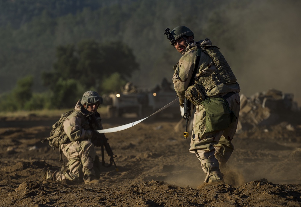 Combat engineers breach through enemy territory to gain ground