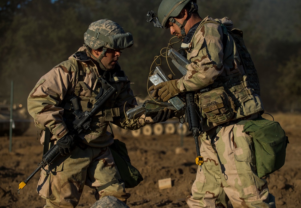 Combat engineers breach through enemy territory to gain ground