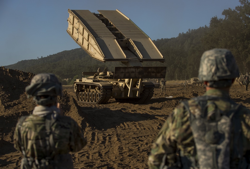 Combat engineers breach through enemy territory to gain ground