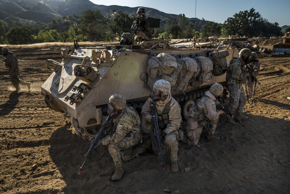 Combat engineers breach through enemy territory to gain ground