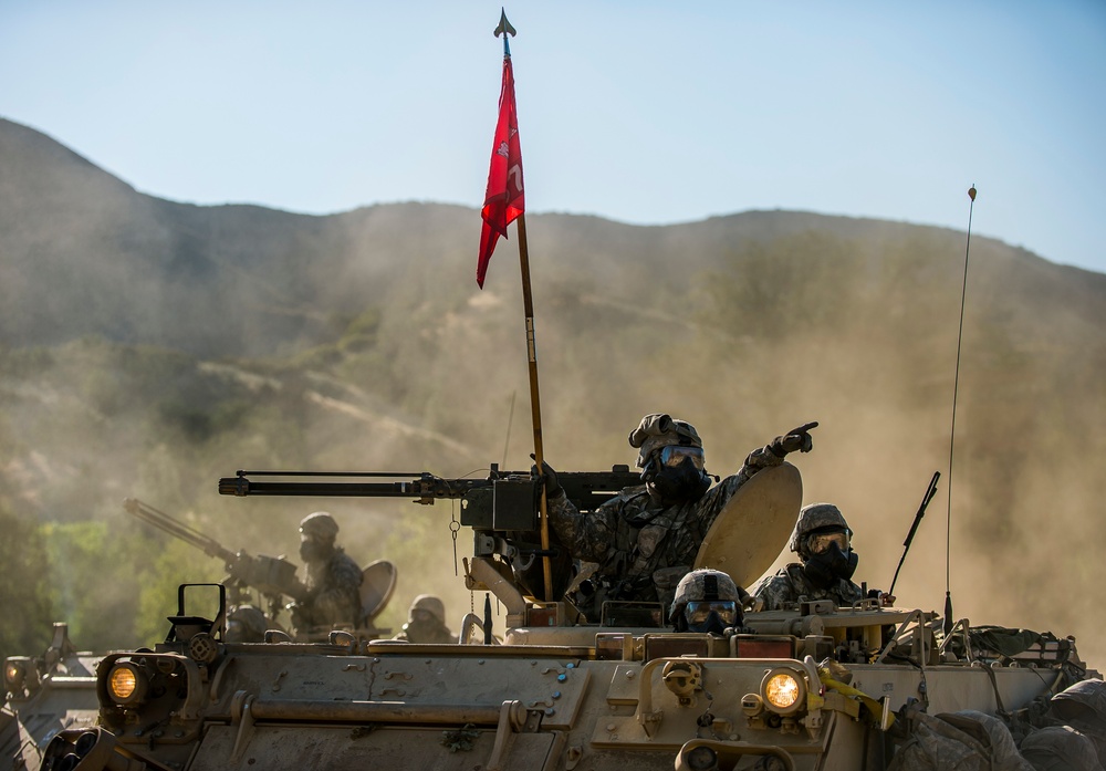 Combat engineers breach through enemy territory to gain ground