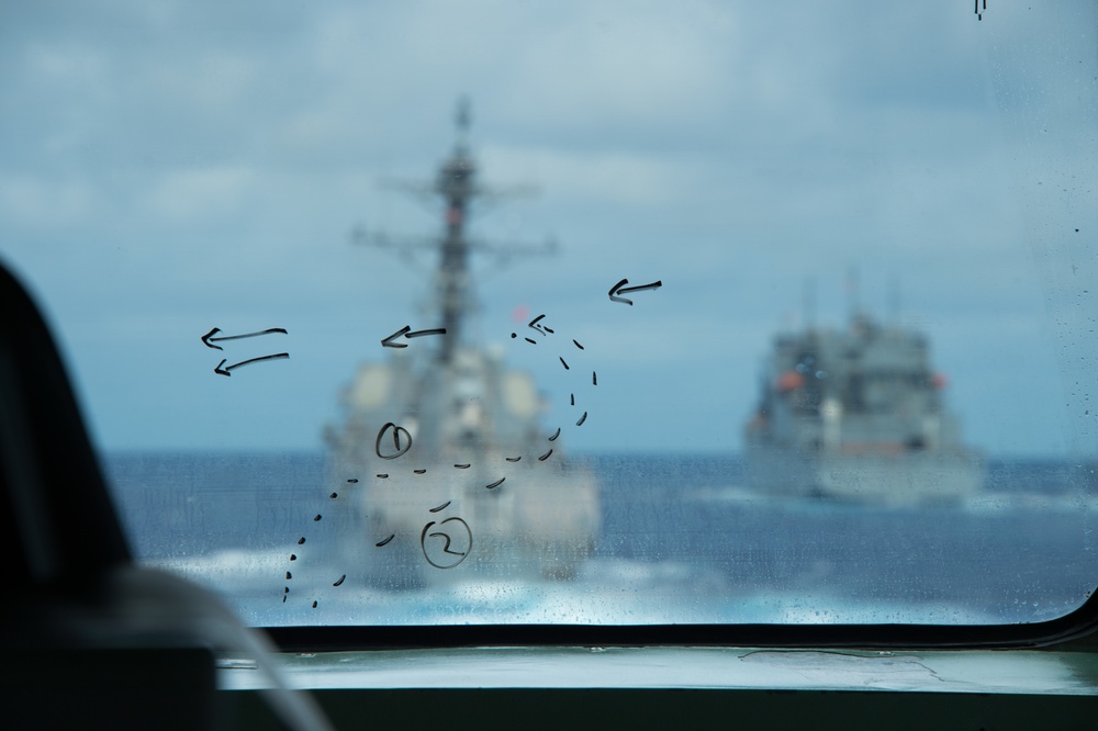 HMCS Vancouver conducts a replenishment-at-sea with USNS Carl Brashear while sailing with USS William P. Lawrence during RIMPAC 2018