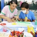 Soldiers spend the day playing with children at Kuwait hospitals