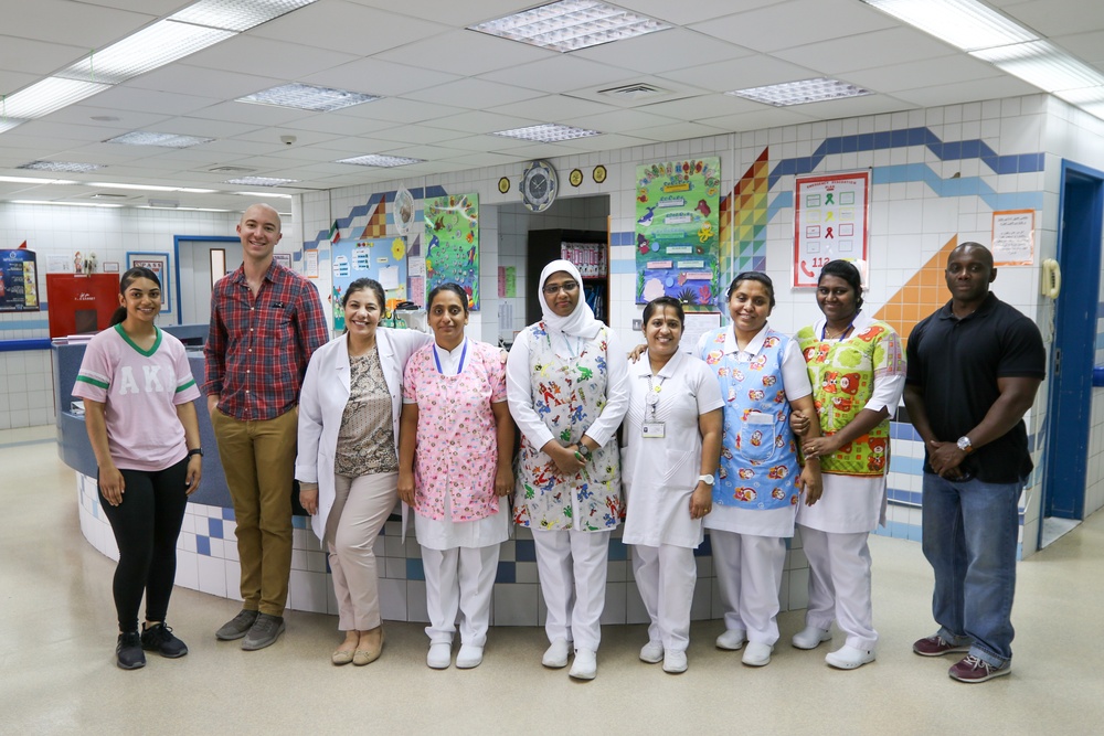 Soldiers spend the day playing with children at Kuwait hospitals
