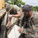 Hammers and shovels: Marines pitch in with Guatemalans to help those displaced by volcano