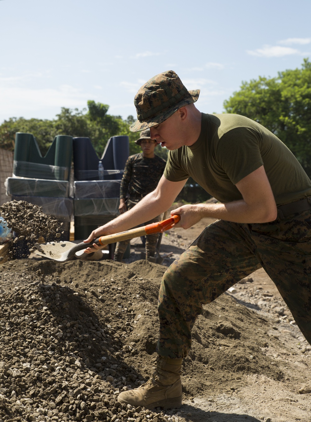 Hammers and shovels: Marines pitch in with Guatemalans to help those displaced by volcano