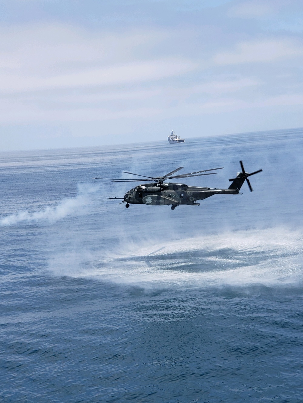 Helicopter Mine Countermeasure Squadron 14 hovering in Southern California during pouncer operations