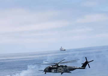 Helicopter Mine Countermeasure Squadron 14 hovering in Southern California during pouncer operations